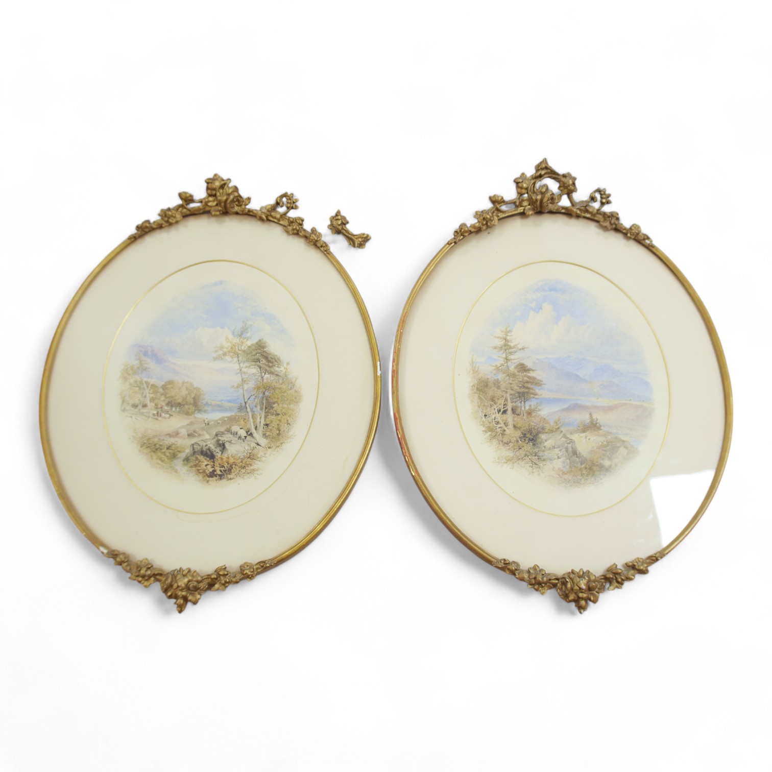 William Hull (1820-1880), pair of oval watercolours, Continental mountainous landscapes, 37 x 30cm, each gilt framed, signed and dated 1856. Condition - fair